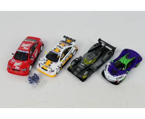 Scalextric - 4 x unboxed slot cars, 2 x Opel Astra Coupe models, a Batmobile and a Joker's car. One of the Astra Coupes has l