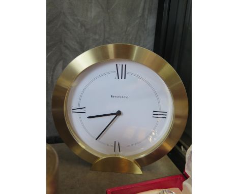 A Tiffany &amp; Co table clock, with heavy brass frame, quartz movement, 16 cm high 