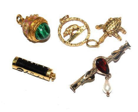A 9 carat gold bar brooch set with a garnet and pearl together with an 18 carat gold tortoise pendant, a gold enamel egg, a w