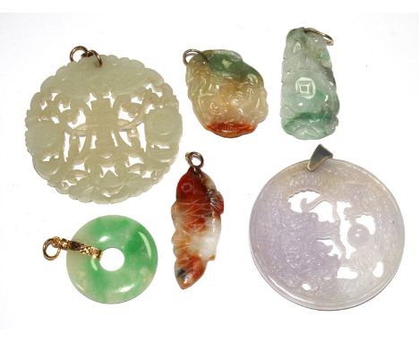 A collection of six carved jade pendants 