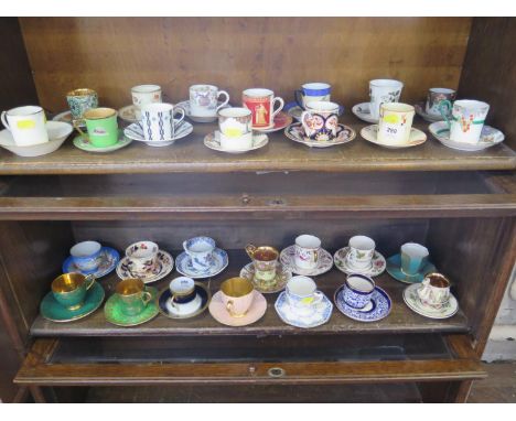 A collection of cabinet cups and saucers, including Royal Worcester, Shelley, Grafton, Crown Devon, Carlton Ware and others 