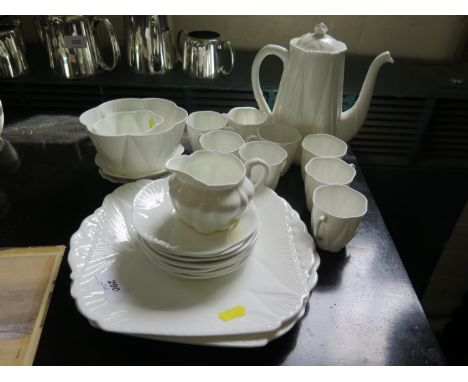 A white Shelley coffee service, with eight cups and saucers, two serving dishes, coffee pot and bowls 