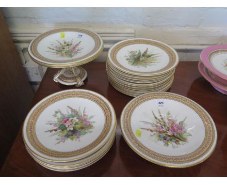 Fourteen Royal Worcester plates, with blue and tan border, each hand painted with a floral centre, 22.5 cm diameter, two matc