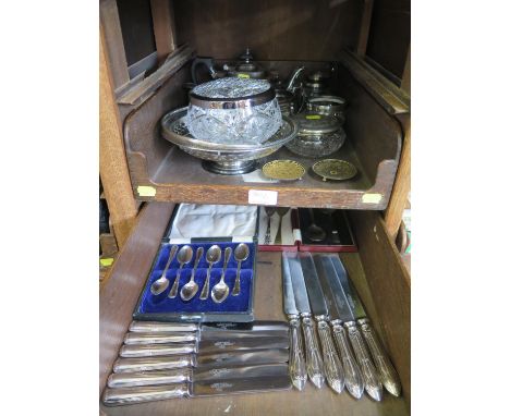 A three piece silver plated tea service, a cut glass rose bowl, other silver plate mounted containers and various flatware (t