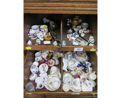 A collection of miniature teawares, including Coalport, Wedgwood and Spode, thimbles, miniature ornaments and a German pipe a