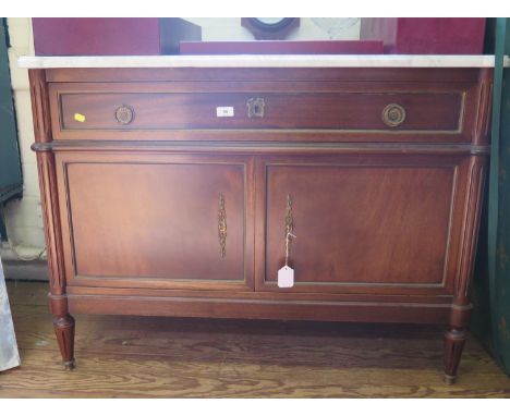 A 19th century style French commode, the marble top over a long drawer and a pair of cupboard doors, on tapering fluted feet,
