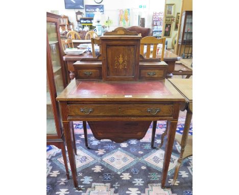 An Edwardian inlaid rosewood lady's writing table and sewing box, the raised back with cupboard door and trinket drawers, ove