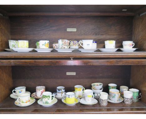A large collection of cabinet cups and saucers, including Royal Worcester, Noritake, Wedgwood, Minton, Aynsley and others 