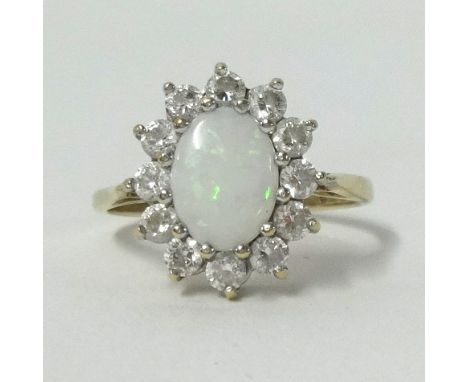 A modern 9ct opal cluster ring, finger size J.