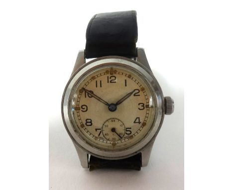 A gents vintage military wristwatch, the back plate stamped ATP43024, set with arabic numerals and sub-second dial, with Swis