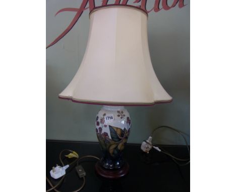 A Moorcroft bramble design table lamp with shade - Height with shade 61cm 
Condition report: Good overall condition, minor fr