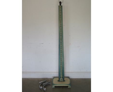 An Art Deco carved wooden floor lamp with stylized carvings on a platform base - Height 160cm and two chrome wall lamp fittin