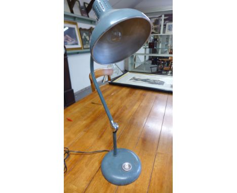 A vintage 1950's French Industrial steel and chrome angle lamp
Condition report:  Cosmetically distressed but in full working