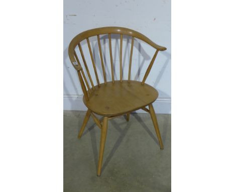 An Ercol elbow chair 