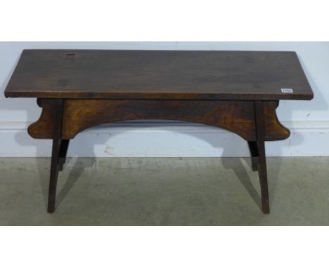 A late 19th/20th century Arts and Crafts oak bench - Height 46cm x 28cm x 90cm 