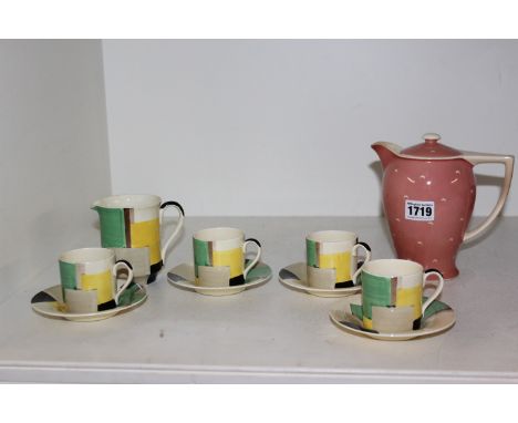 Four Susie Cooper coffee cans and saucers and a milk jug with geometric design and a crescent design water jug
Condition repo