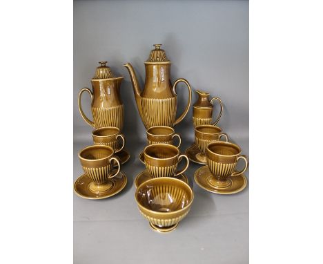 A Carlton ware coffee service - consisting of coffee pot, hot water jug, milk jug, sugar bowl and six cups and saucers, finis