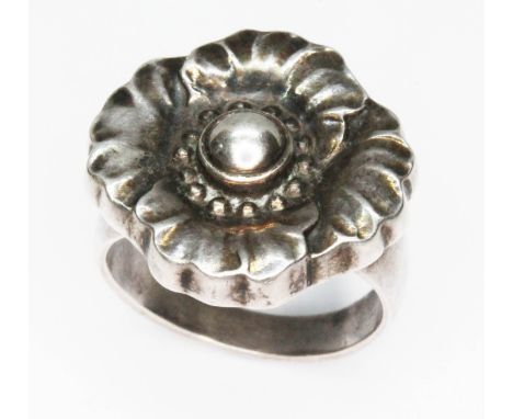 A Georg Jensen ring no. 73, circa 1933-1944, monogrammed 'GJ', marked '925' and 'Sterling Denmark', wt. 5.6g, size L.  Condit