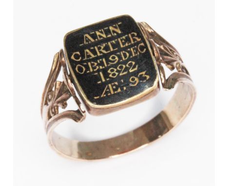 A Georgian mourning ring, swivel panel set with a carnelian seal to one side and the other engraved 'ANN CARTER OB 19DEC 1822