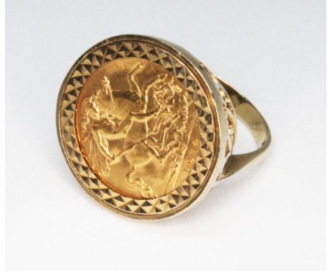 A hallmarked 9ct gold ring set with a George V  1912 half sovereign, gross wt. 8.7g, size R.  