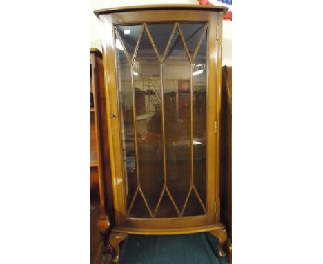 A Modern Bow Fronted Shelf Display Cabinet.