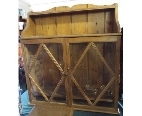 A Pine Glazed Wall Hanging Kitchen Cupboard with Inner Shelf and Raised Display Shelf with Gallery.