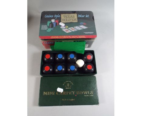 A Set of Mini Carpet Bowls and A Casino Style Poker Set.
