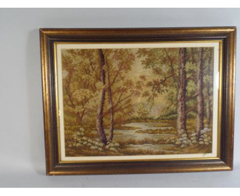 A 20th Century Framed Wall Tapestry Woodland Pond.