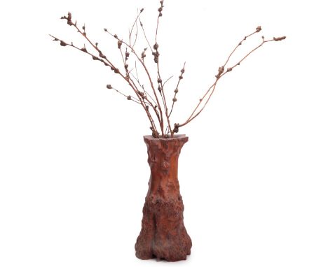 Burl wood trunk carved vase with burl covered  branches. H:16 1/2in(24.1cm) W:7in(17.7cm)