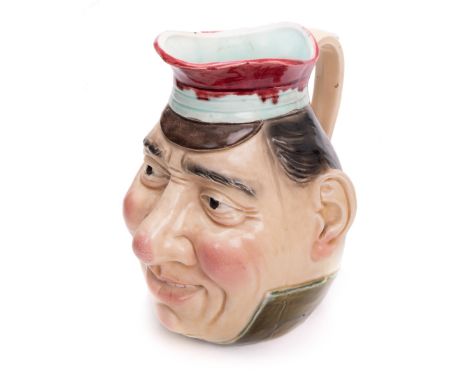 Ceramic Majolika head pitcher. H:8.5in(21.5cm) W:6.25in(15.8cm)