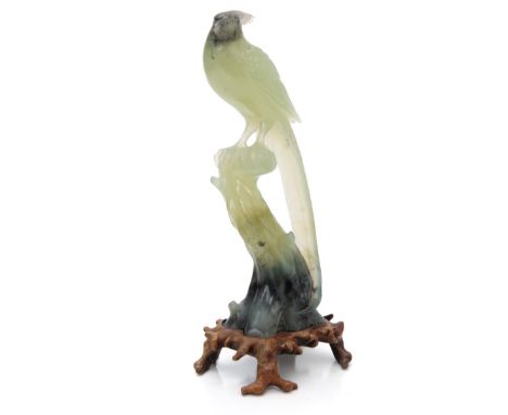 Chinese carved jade bird on branch. Custom base. 31.5oz H:10.5in(26.6cm) W:4in(10.1cm)