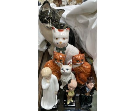 A Studio Six model of a cat designed by Seneshall, together with a pair of Babbacombe pottery cats, Staffordshire type cat, B