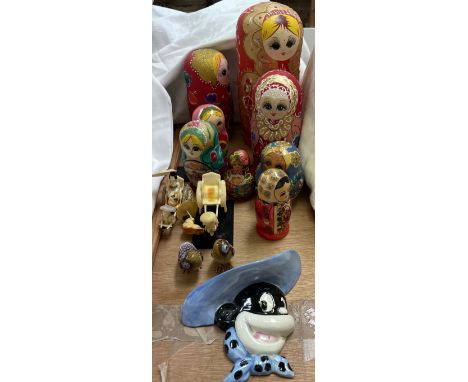 A collection of Russian dolls together with cloisonne enamel owls, and other figures