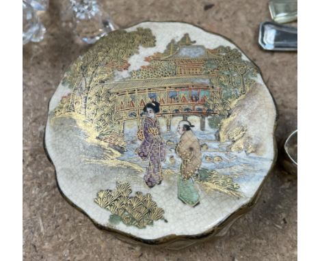 A Japanese satsuma pottery box and cover together with a Lladro figure, Swarovski crystal, plates, electroplate etc