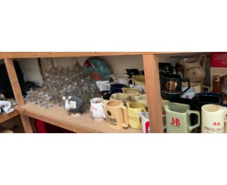 A John Hughes pottery sheep "We'll miss ewe", together with a collection of breweriana including water jugs, babycham glasses