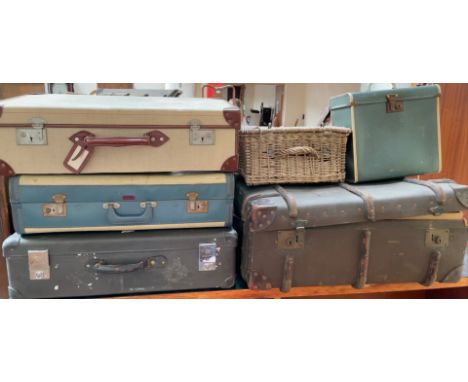 A banded trunk together with three suitcases, a record case and a hamper
