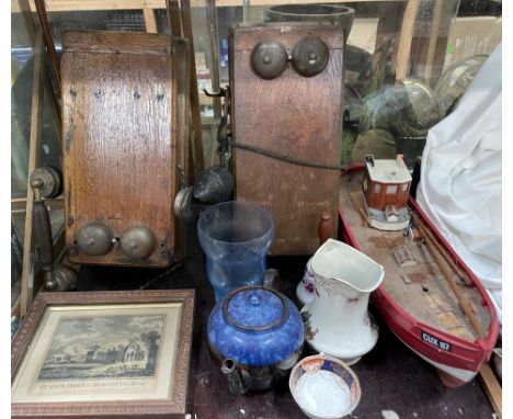 Two wooden wall mounted telephones together with a model ship, print of Merionythshire and assorted ceramics