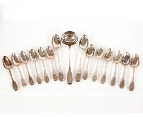 A composite suite of George III silver "Fiddle" pattern flatware,&nbsp;bearing family crest, various dates and makers includi