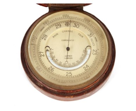 A leather crocodile effect cased pocket barometer,&nbsp;by Asprey of London, 8.5cm dia.&nbsp;