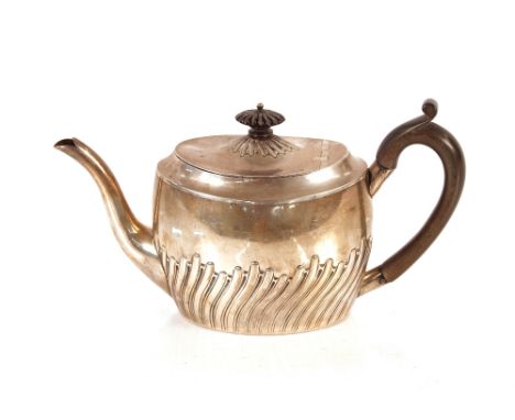 A late Victorian silver teapot,&nbsp;with half fluted body design, black wood handle and lift, Sheffield 1892