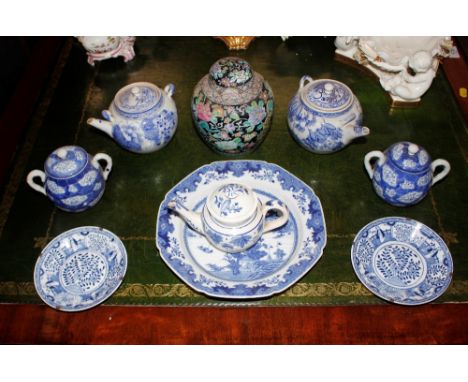 A small 19th Century Staffordshire blue and white teapot,&nbsp;having floral decoration; a Chinese Nanking octagonal shallow 