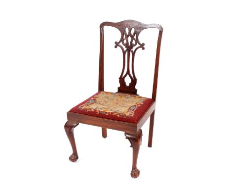 A 19th Century mahogany Chippendale style side chair, with pierced splat back above needlepoint upholstered drop in seat, rai