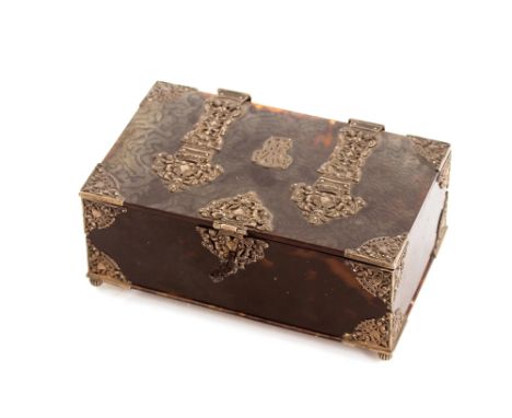 A 19th Century tortoiseshell and white metal mounted trinket casket,&nbsp;having pierced foliate and cherub decorated mounts 