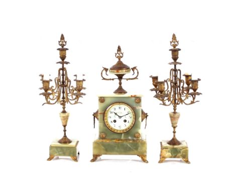 A green marble and gilt metal mounted clock garniture,&nbsp;the clock with circular enamelled floral dial supporting an eight