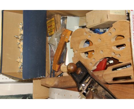A box containing various violin and guitar making tools including saws, chisels, spares, etc, 