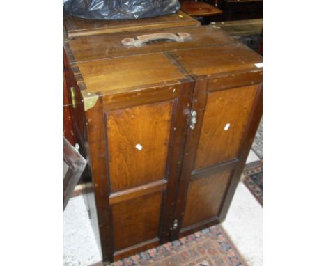 A 19th Century mahogany Campaign bookcase with leather carrying handles and brass fixings, together with a mahogany demi-lune