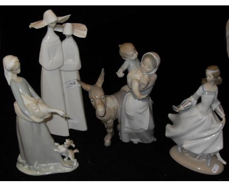 A Lladro figure group of woman with child and donkey, girl in medieval dress, two nuns and girl with goose and dog (4)