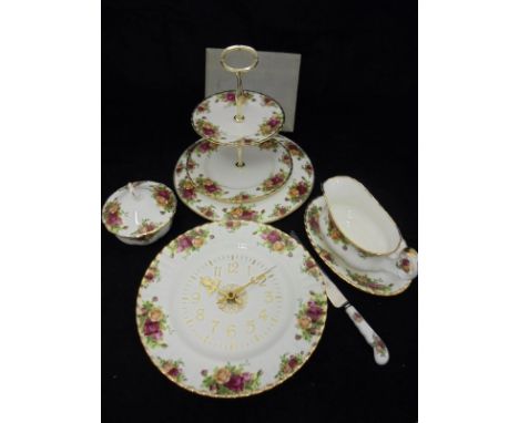 A quantity of Royal Albert "Old Country Roses" chinaware including a sauceboat and stand, cake stand, two tier sandwich plate