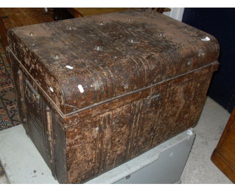 A tin domed top trunk