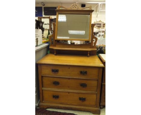 An Edwardian satin walnut dressing chest with mirror to the superstructure, above three drawers, raised on bracket feet, toge